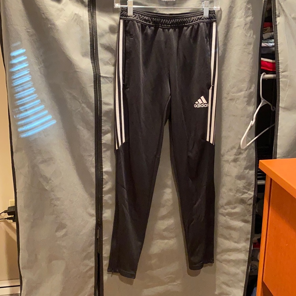 Adidas track pants. Size small. Worn but still in good condition.